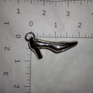 Silver high heel pendant charm